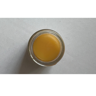 A natural balm in a glass jar